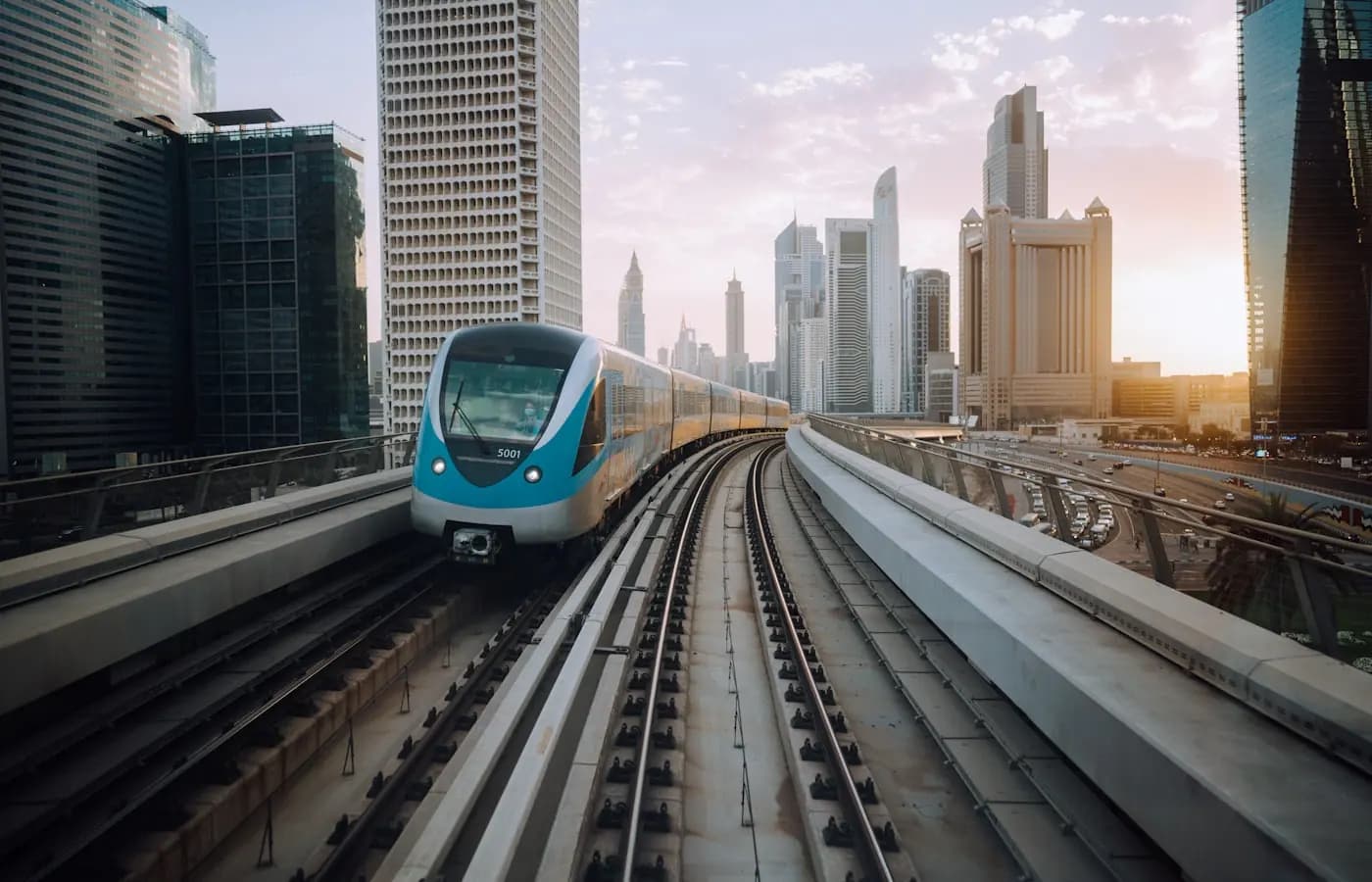 Dubai metro train with the skyline behind